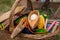 Weaving shuttles and multi-colored yarn in a basket