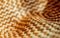 Weaving straws texture. Woven hat with pattern and texture. Close-up horizontal background