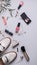 Web banner. Cosmetics and fashion blogger background. Flat lay. Makeup, accessories on a light background. Top view. Vertical shot