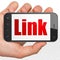 Web design concept: Hand Holding Smartphone with Link on display