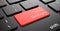 Web Design on Red Keyboard Button.