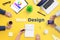 Web design team work on project concept. Yellow desk with web design text