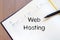 Web hosting write on notebook