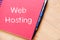 Web hosting write on notebook