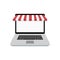 Web online store. Laptop with awning