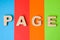 Web page word concept photo. Word page from 3D volume letters is in background of four colors - blue, red, orange and green. Using