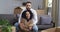 Webcam view husband and wife interracial family couple afro american woman and caucasian man sitting on couch at home in