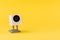 webcam white on a yellow background, object, Internet, technology concept