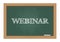 Webinar text on chalkboard