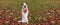 WEBSIDE BANNER AUTUMN DOG. JACK RUSSELL PUPPY STANDING ON TWO HIND LEGS  AND LINKING WITH TONGUE OUT ON FALL LEAVES GRASS