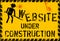 Website under construction sign, grungy,vector