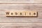 Website word written on wood block. Website text on table, concept