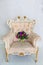 Wedding accessories Beautiful wedding bouquet of tulips and pions standing vintage-chair