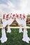Wedding arch with floral decoration outdoors