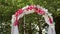 Wedding Arch with flowers on the grass