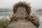 Wedding arch on the lake in foggy autumn morning