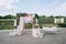 Wedding arch made of fabric and fresh flowers, roses, hydrangeas, eustoma, greenery and eucalyptus