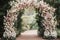 Wedding Arch With Pink and White Flowers - Elegant Outdoor Ceremony Decoration, An intimate garden wedding beneath a floral