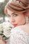 Wedding background. Beautiful profile of the bride with a bouquet. The concept of the beginning of family life, marriage. Lace we