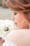 Wedding background. Beautiful profile of the bride with a bouquet. The concept of the beginning of family life, marriage. Lace we