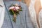 Wedding background, boutonniere on the grooms jacket