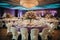 Wedding Banquet Table Decorated with Flowers and Tablecloth.