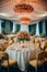 Wedding Banquet Table Decorated with Flowers and Tablecloth.