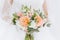 Wedding beauty orange wedding flowers.