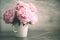 Wedding, birthday, anniversary bouquet. Pink peony flower on marble background. Copy space. Trendy pastel floral composition.