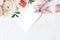 Wedding, birthday stationery mock-up scene. Blank gift tag, label with pink silk ribbon. Decorative floral corner. Green