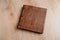 Wedding book with a wooden cover on a wooden texture