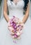 Wedding bouquet in bride`s hands