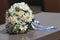 Wedding bouquet cream roses and chamomile