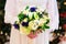 Wedding bouquet of flowers in brides hands