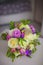 Wedding bouquet of flowers from freshly cut roses and other beautiful flowers in the composition