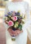 Wedding bouquet flowers in hands elegant bride