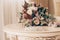 Wedding bouquet lying on the table. jewelry crown in the foreground