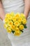 Wedding bouquet with many yellow roses
