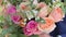 Wedding bouquet of peach roses by David Austin, single-head pink rose aqua, eucalyptus, ruscus, gypsophila