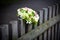 Wedding bouquet on rustic country fence
