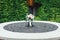 Wedding bouquet in a stone circle under vintage street lamp