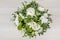 Wedding bouquet with white flowers and green leaves