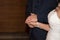 Wedding bride groom rings and hands in church ceremony