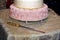 Wedding cake knife with golden fabric on table