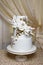 Wedding cake of three tiers of white mastic