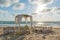 Wedding canopy and chairs on the beach.