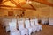 Wedding celebration ceremony room with chairs and arch