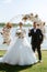 wedding ceremony of the newlyweds on the pier