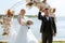 wedding ceremony of the newlyweds on the pier