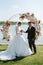 wedding ceremony of the newlyweds on the pier